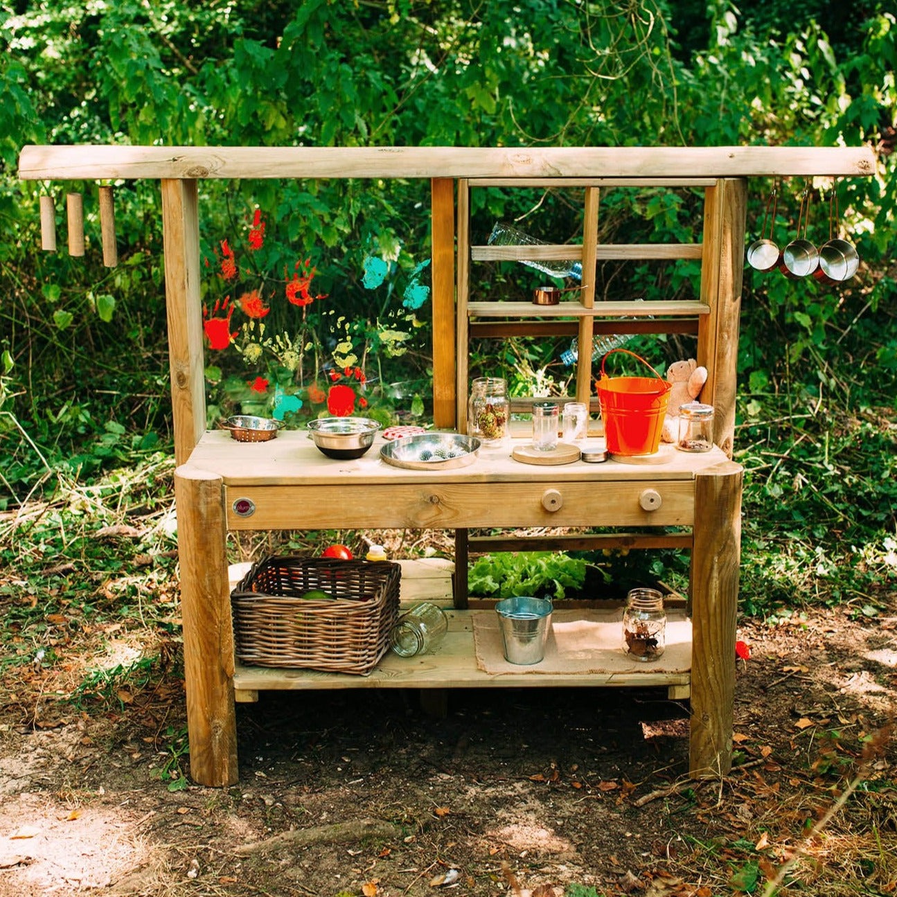 Wooden Outdoor Mud Kitchen with pots and pans