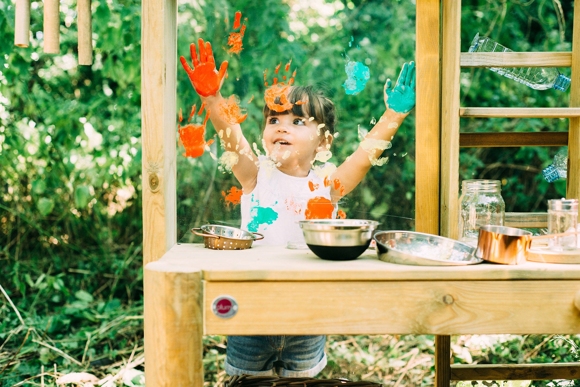 Wooden Outdoor Mud Kitchen with pots and pans