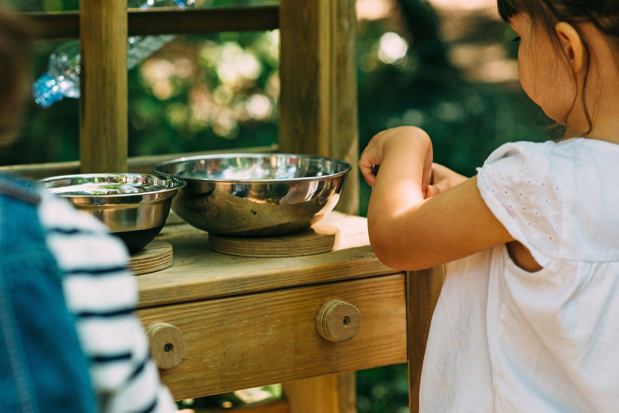 Wooden Outdoor Mud Kitchen with pots and pans