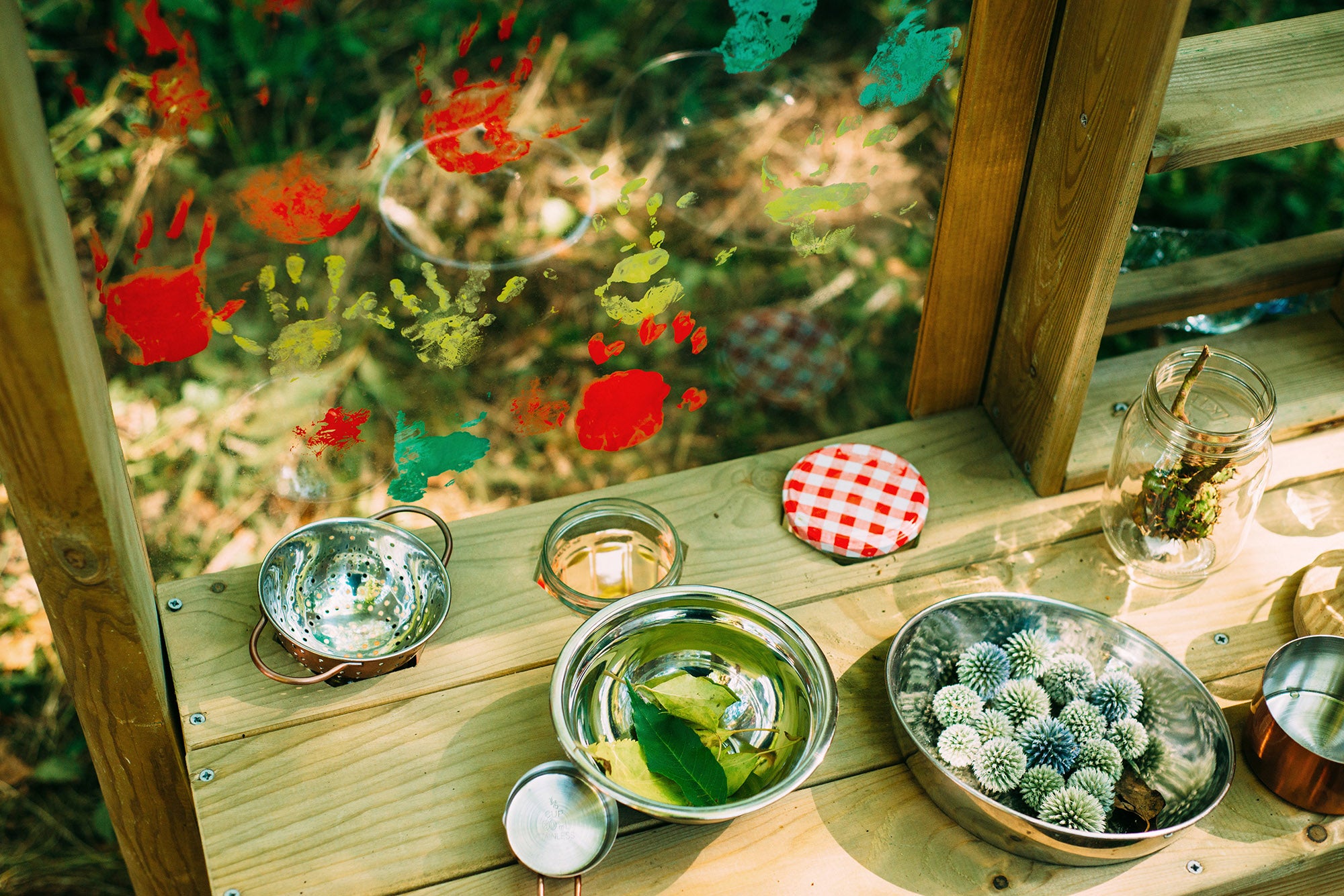 Wooden Outdoor Mud Kitchen with pots and pans