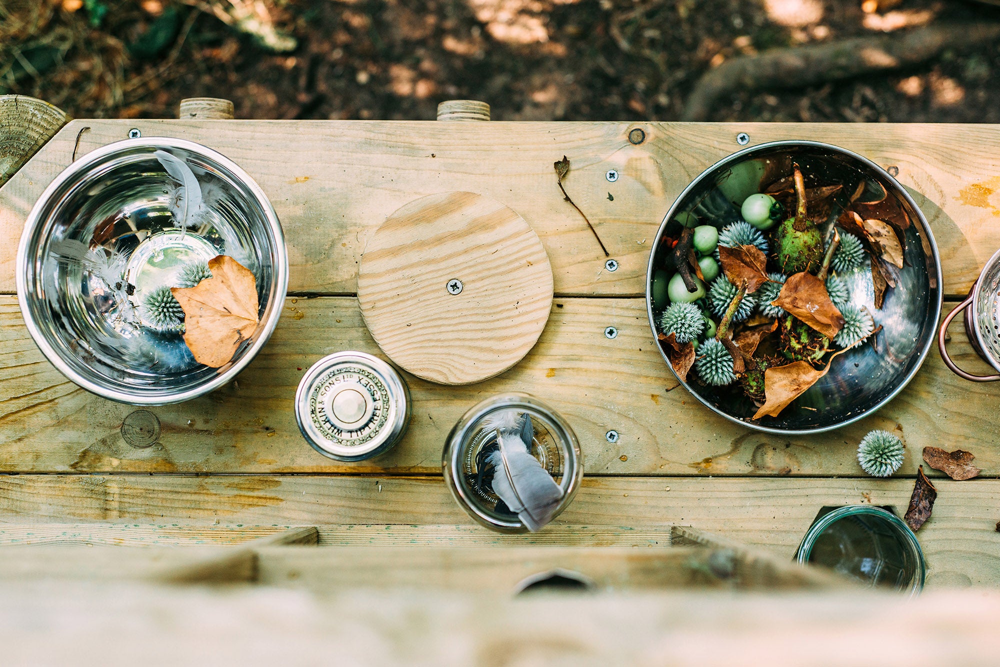 Wooden Outdoor Mud Kitchen with pots and pans